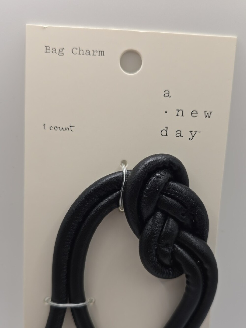a new day Black Knot Bag Charm with Gold-Tone Caps - Picture 2 of 4